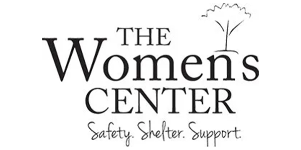 Logo for The Womens Center featuring a stylized tree icon above the text and the tagline Safety. Shelter. Support. below.